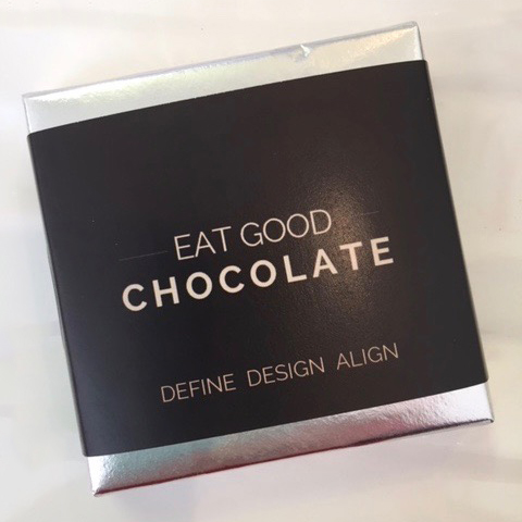 A chocolate bar with a label reading: EAT GOOD CHOCOLATE